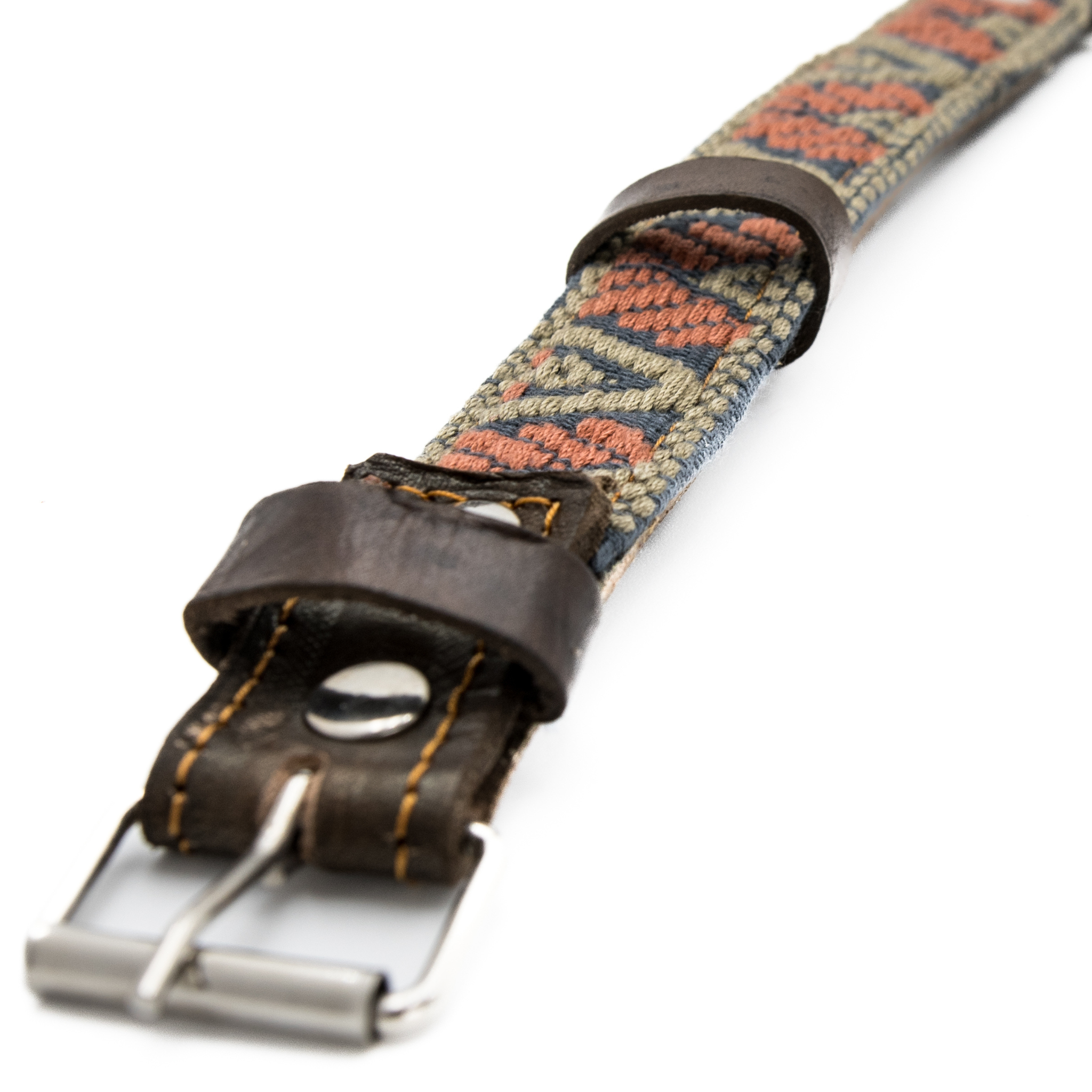 Image of a sturdy steel buckle on a Bronze Olive leather dog collar, emphasizing robust construction.
