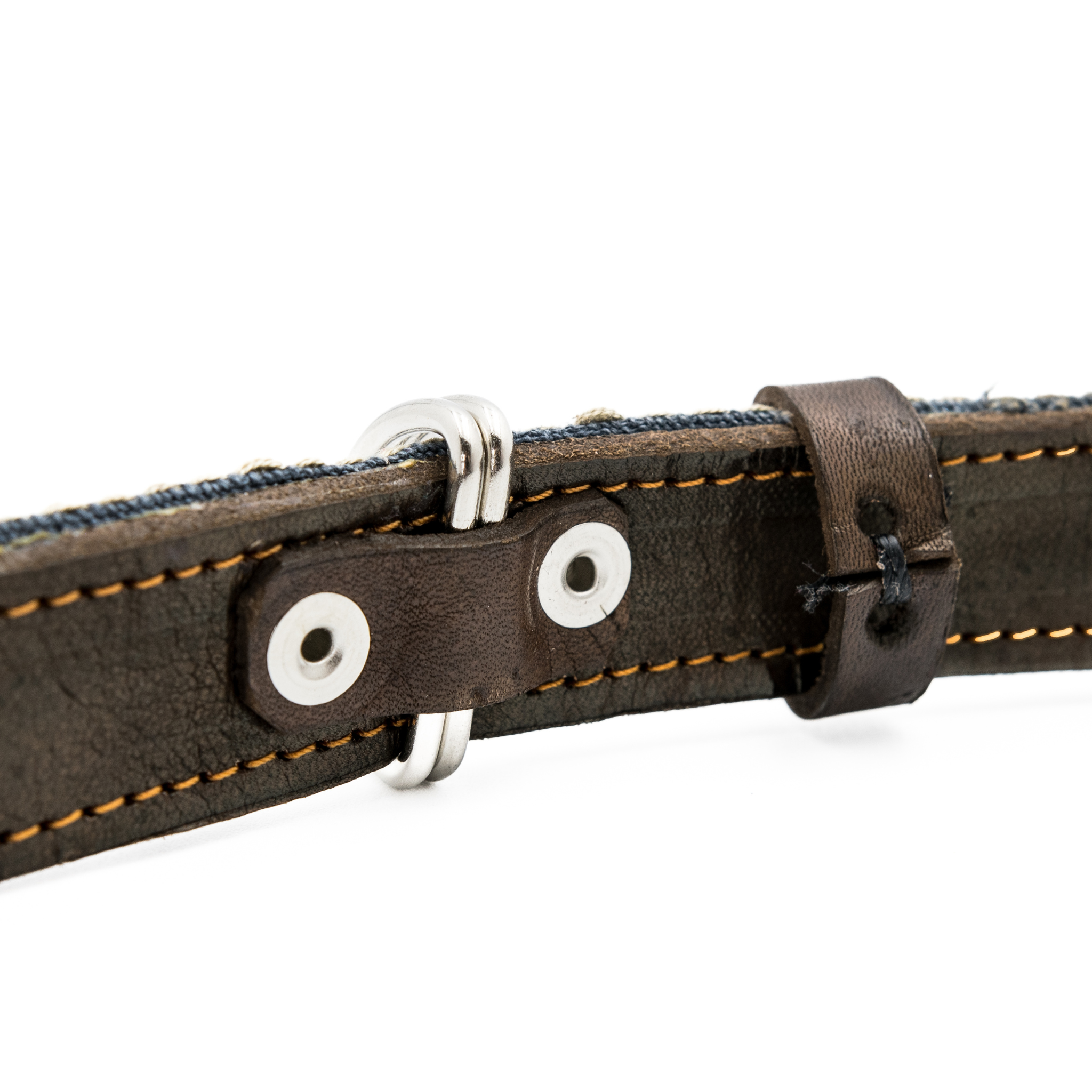 Close-up of the inner D-ring protection on a Bronze Olive leather dog collar, enhancing durability.